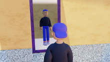 Boy standing in front of mirror.